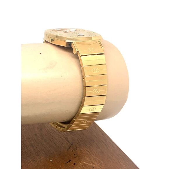 Gucci Unisex Watch YA157403 Grip Swiss Quartz Jump Hour Dial Gold Steel 35mm - Picture 12 of 14